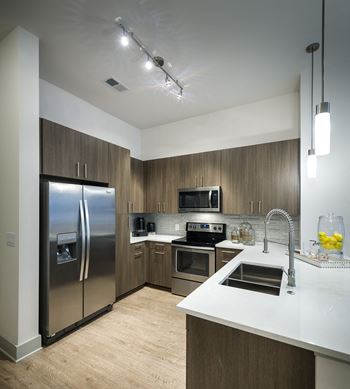 Gourmet chef kitchen with stainless steel appliances